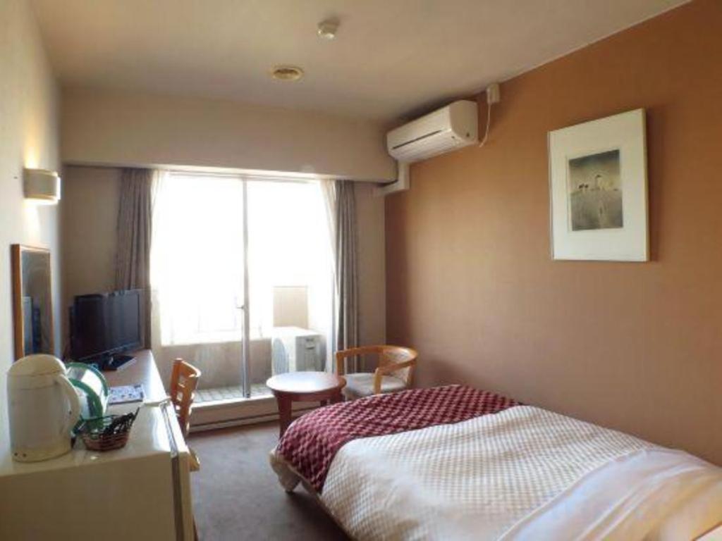 Hotel Tenchikaku Hitachi Buitenkant foto