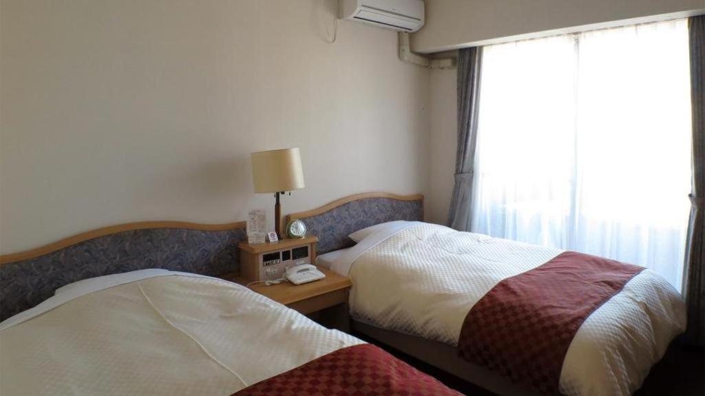 Hotel Tenchikaku Hitachi Buitenkant foto