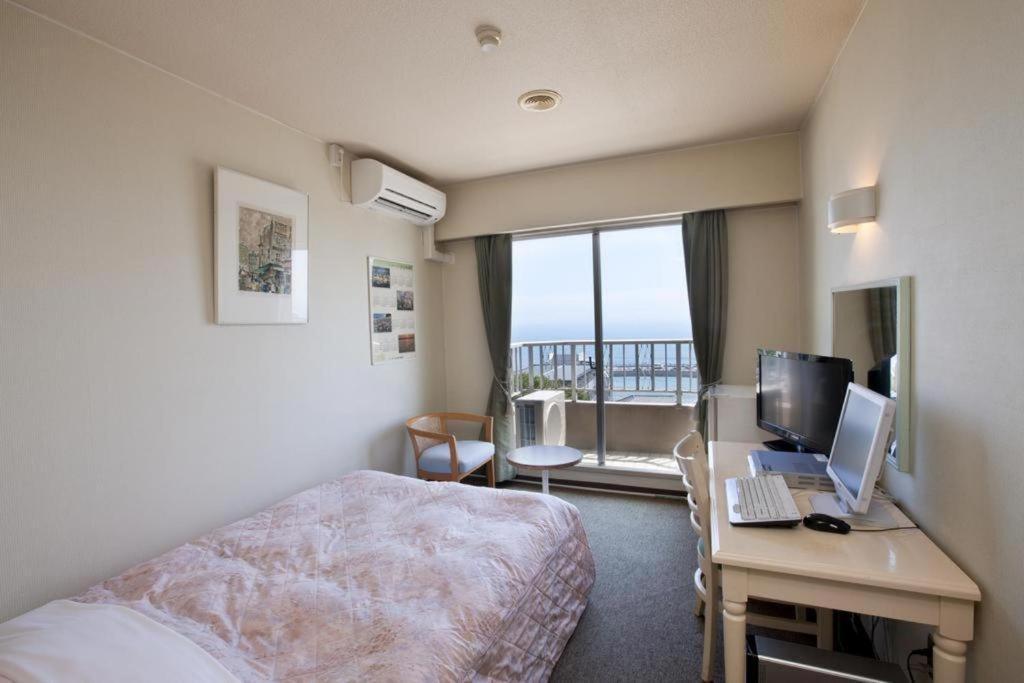 Hotel Tenchikaku Hitachi Buitenkant foto