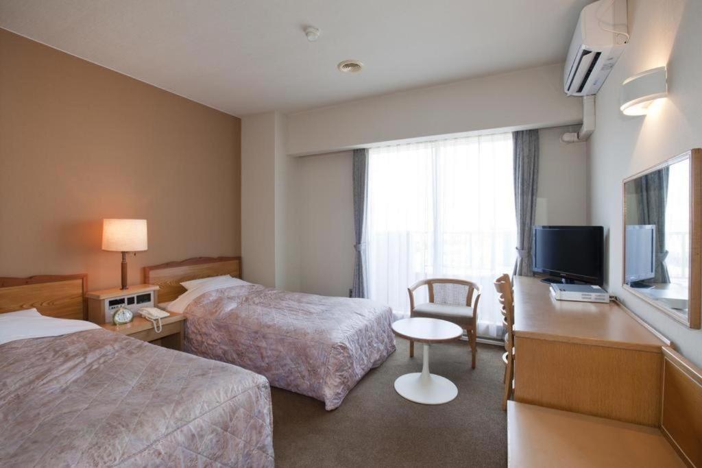 Hotel Tenchikaku Hitachi Buitenkant foto
